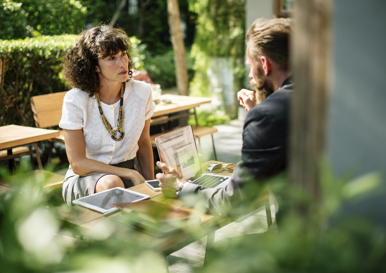 most common interview questions - two persons having an outdoor meeting
